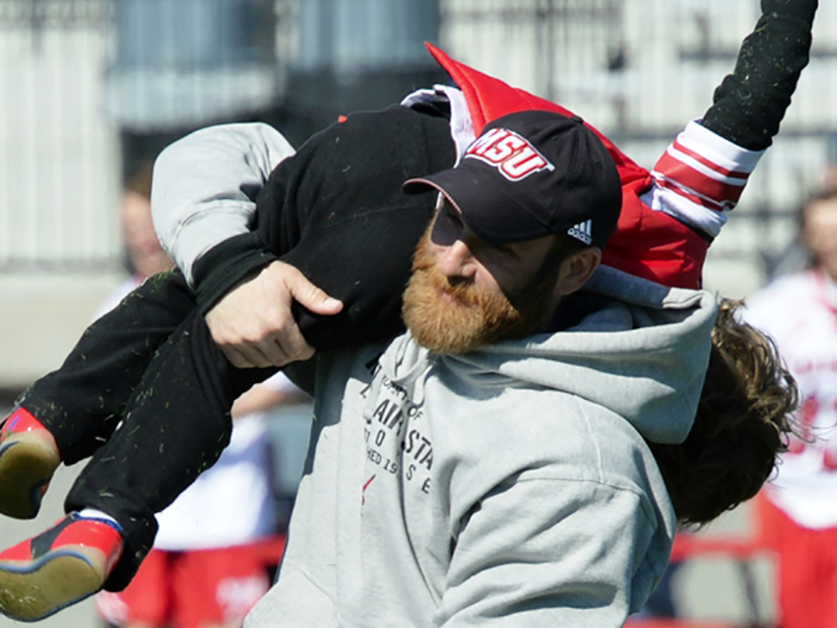 Schambach enjoying a moment with his son.