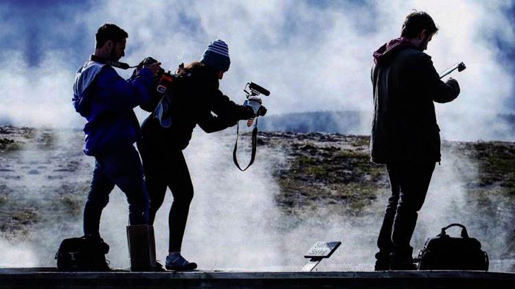 Jets of steam surround Montclair State students as they record sounds and film the Grand Tetons and the geysers and mud pits of Yellowstone National Park.