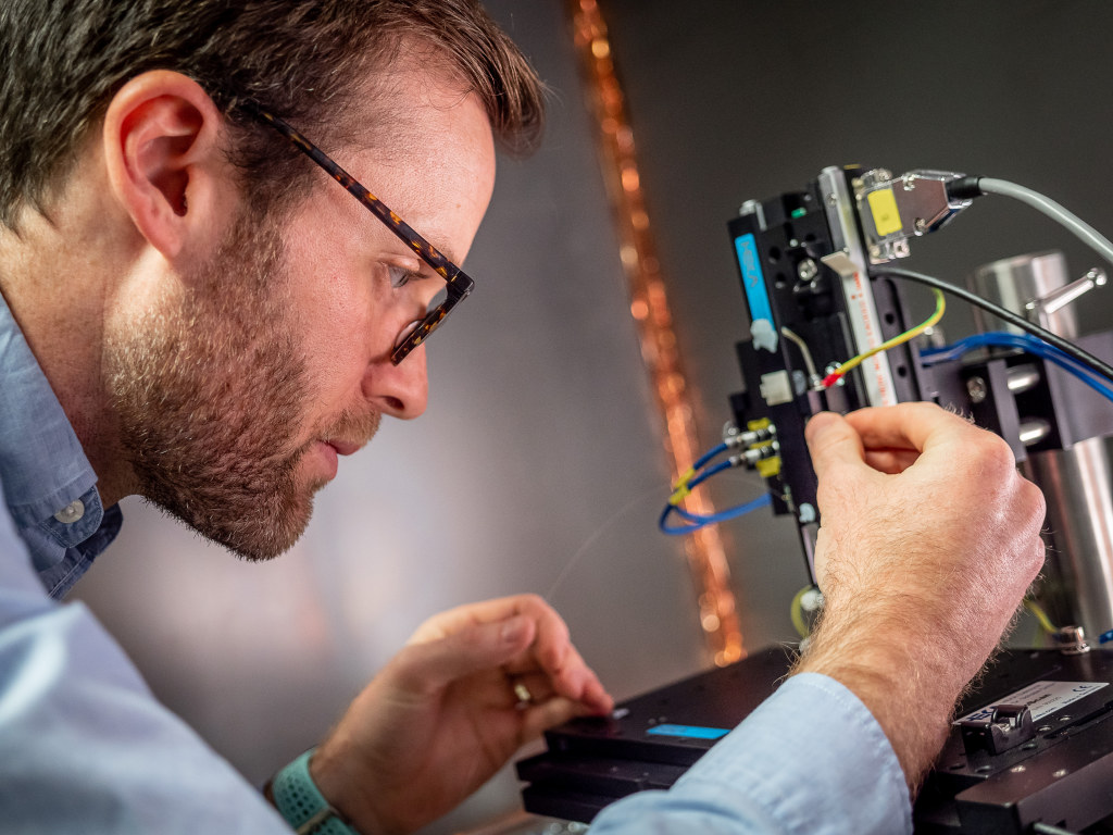 Chemistry Professor Glen O'Neil, recipient of an NSF CAREER grant, at work in his lab.
