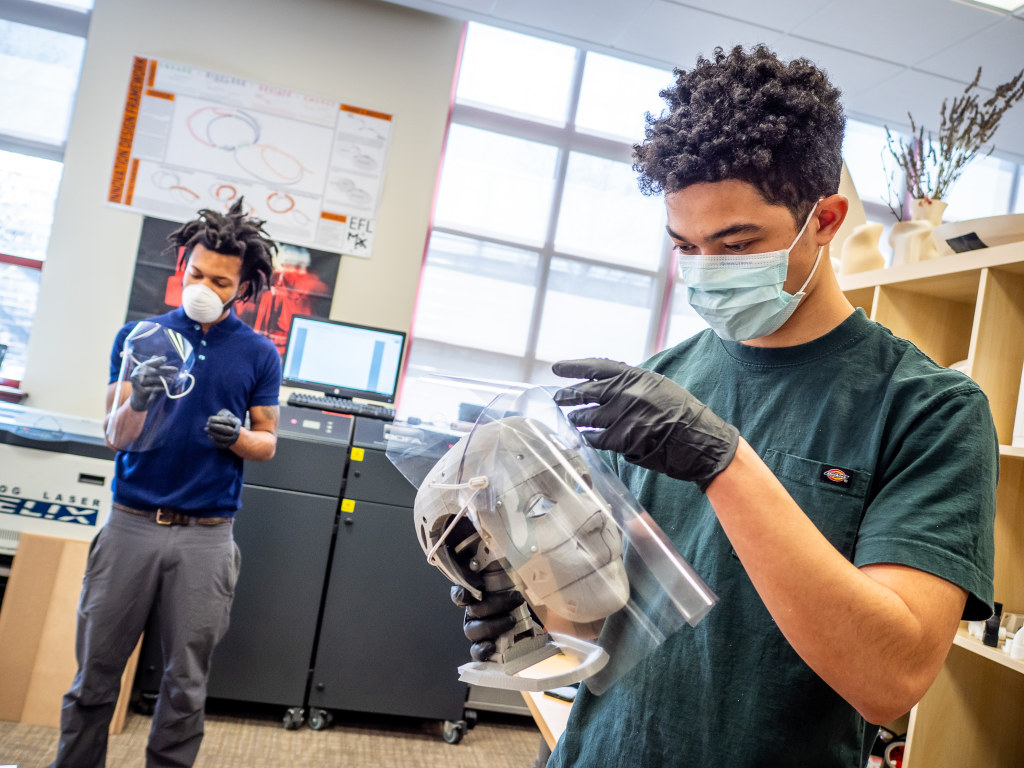 Alex McDonald tests a face shield design at Montclair State's MIX Lab.