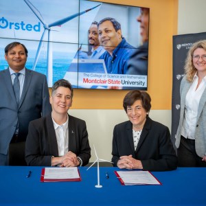 At the announcement, Kris Ohleth, senior stakeholder relations manager for U.S. Offshore Wind Division, Ørstedrom, seated left, with University President Susan A. Cole and Montclair State's Pankaj Lal, founding director of the Clean Energy and Sustainability Analytics Center, and Lora Billings, dean of the College of Science and Mathematics.