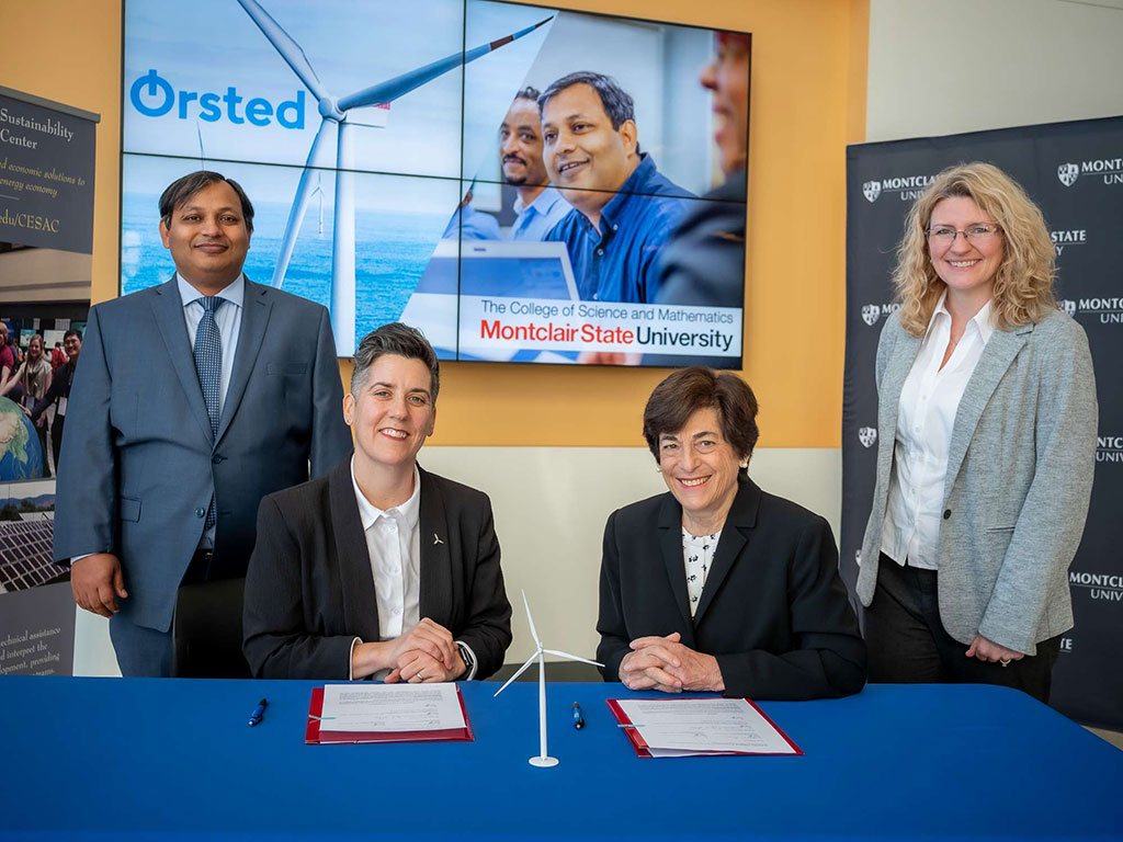 At the announcement, Kris Ohleth, senior stakeholder relations manager for U.S. Offshore Wind Division, Ørstedrom, seated left, with University President Susan A. Cole and Montclair State's Pankaj Lal, founding director of the Clean Energy and Sustainability Analytics Center, and Lora Billings, dean of the College of Science and Mathematics.