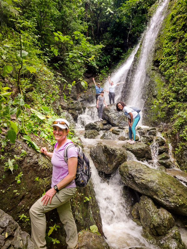Associate Professor Jennifer Krumins at a Galápagos waterfall during the research trip in early March with Montclair State biology students in the days before social distancing. Shown are Ann Muthee, Stephanie Getto, Alorah Bliese and Siena Stucki.