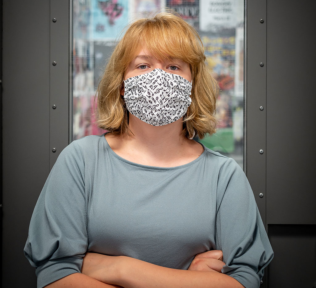 Carley Campbell hosts one radio program from the studio, alone, and one from her dorm room.