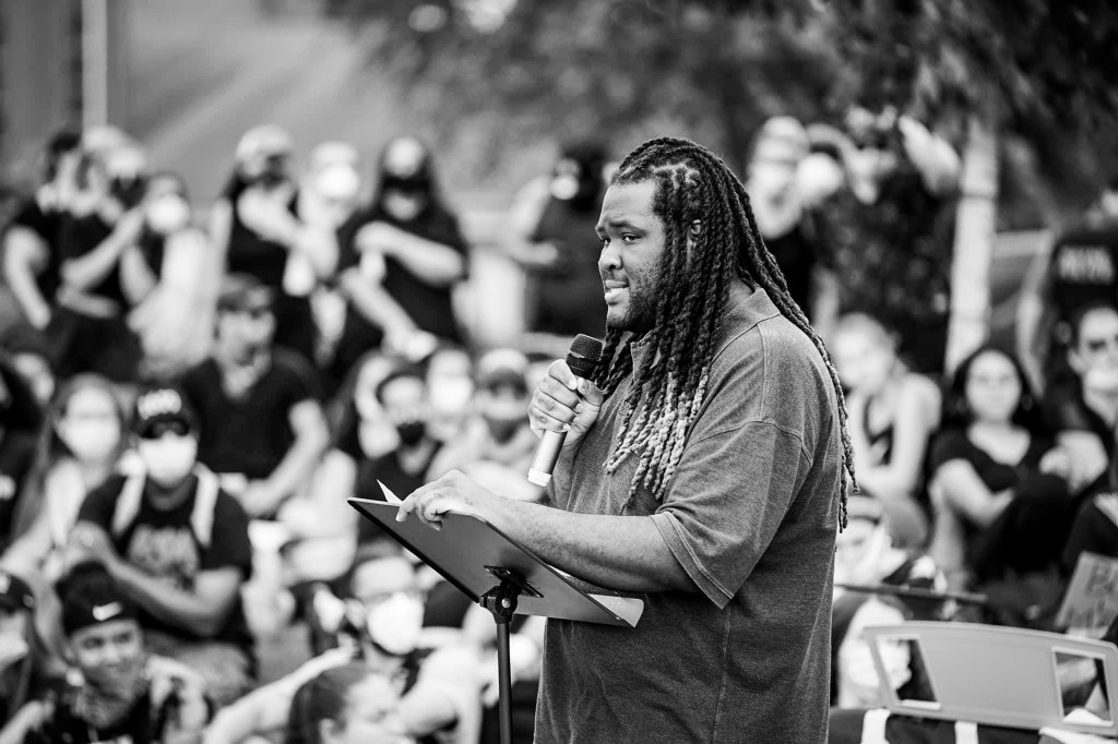 Jason Williams, assistant professor of Justice Studies, speaks at a demonstration in Wayne, New Jersey. Photo by Neil van Niekerk