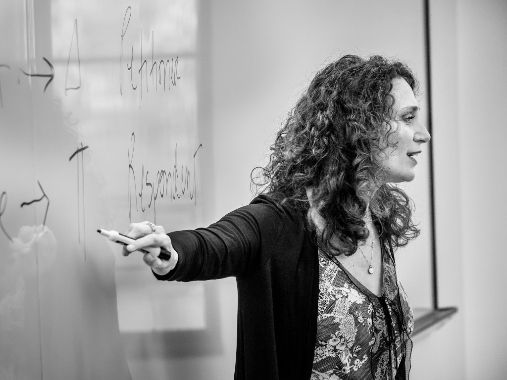 Associate Professor Jessica Henry teaches a class on the justice system.