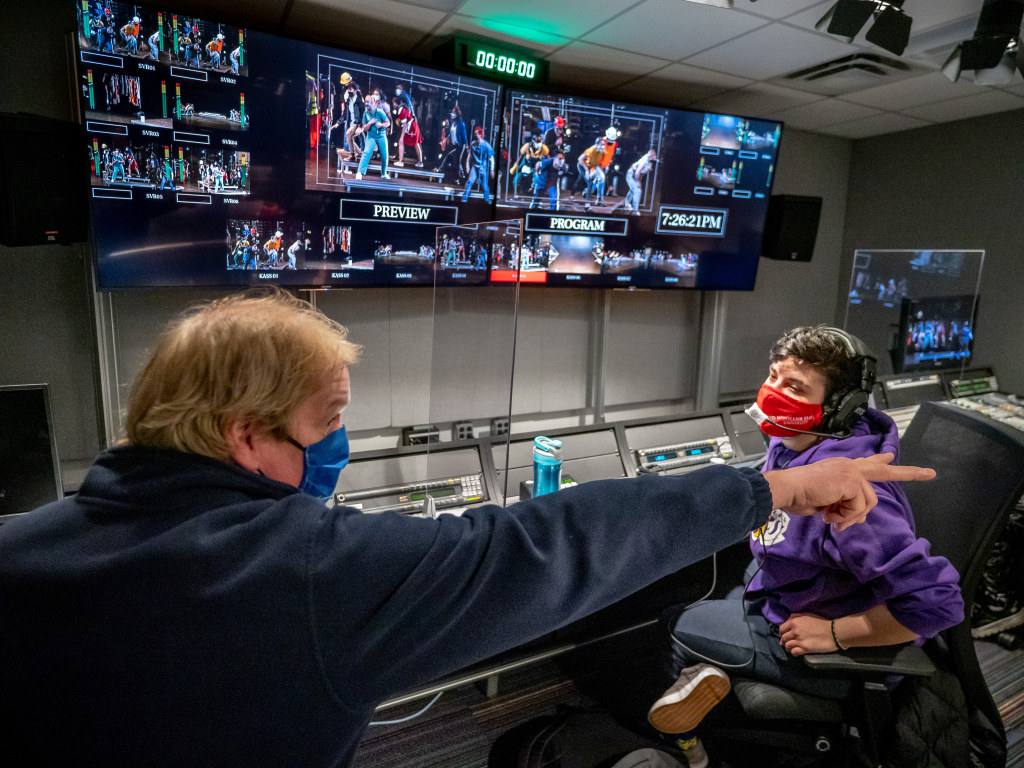 School of Communication and Media Professor Stuart MacLelland (left) with Carter Winner ’22 in the production room at the Kasser Theater.
