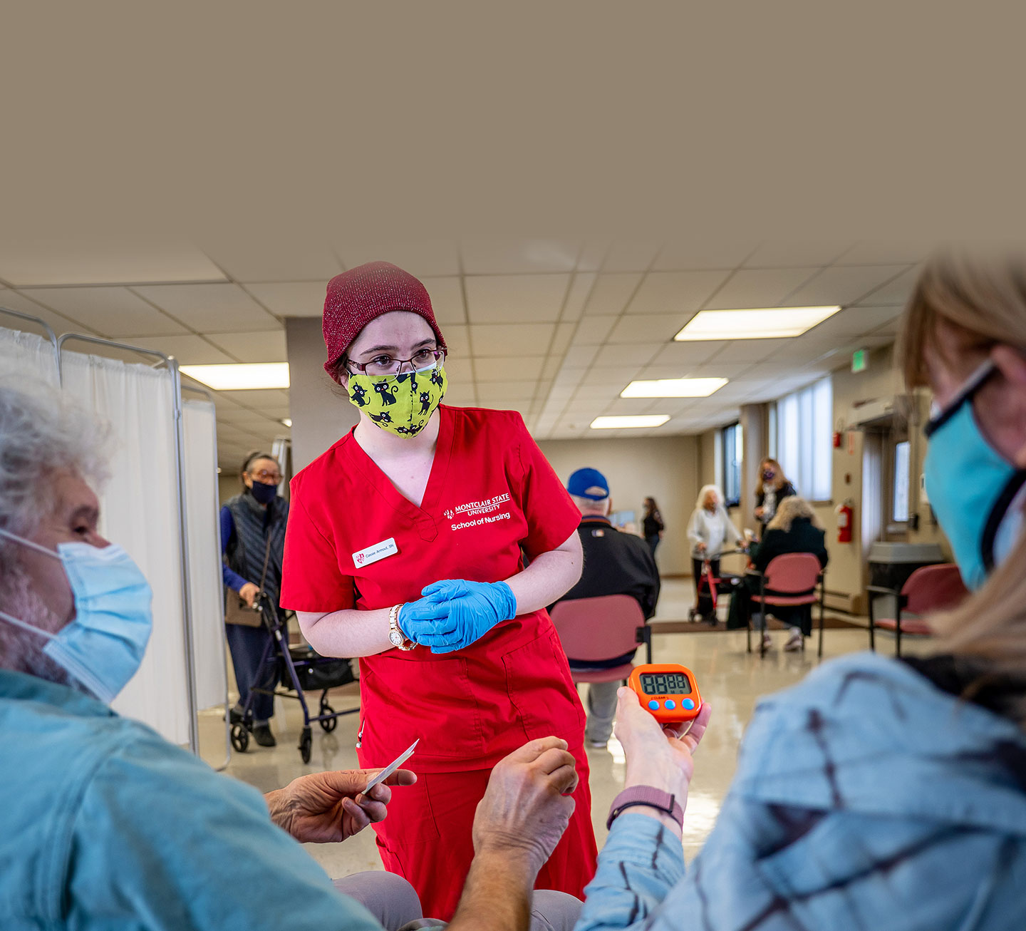 Cassie Armout, a sophomore BSN major, monitored senior citizens after they received a dose of the COVID-19 vaccine at the John Reena Senior Apartments in West Orange. Nursing students assisted with vaccination appointments, registration, line control and patient monitoring in the partnership with the West Orange Health Department.
