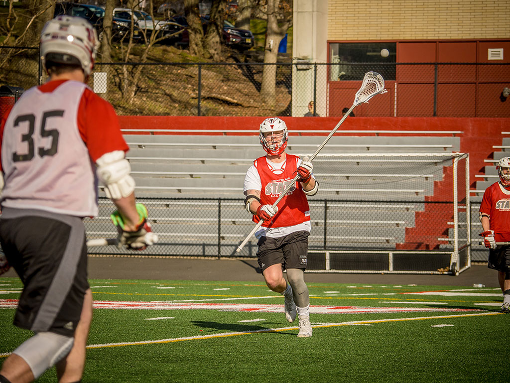 Front shot of Max Frankovits playing lacrosse.