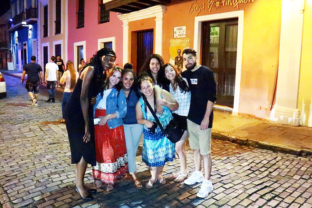 SCM students Madjiguene Traore, Madison Glassman, Natalie De La Rosa, Babee Garcia, Laura Galarza, Genesis Obando and Mariano Arocho on the final evening in Old San Juan.