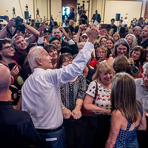 Vice President Joe Biden takes a selfie with students and fans