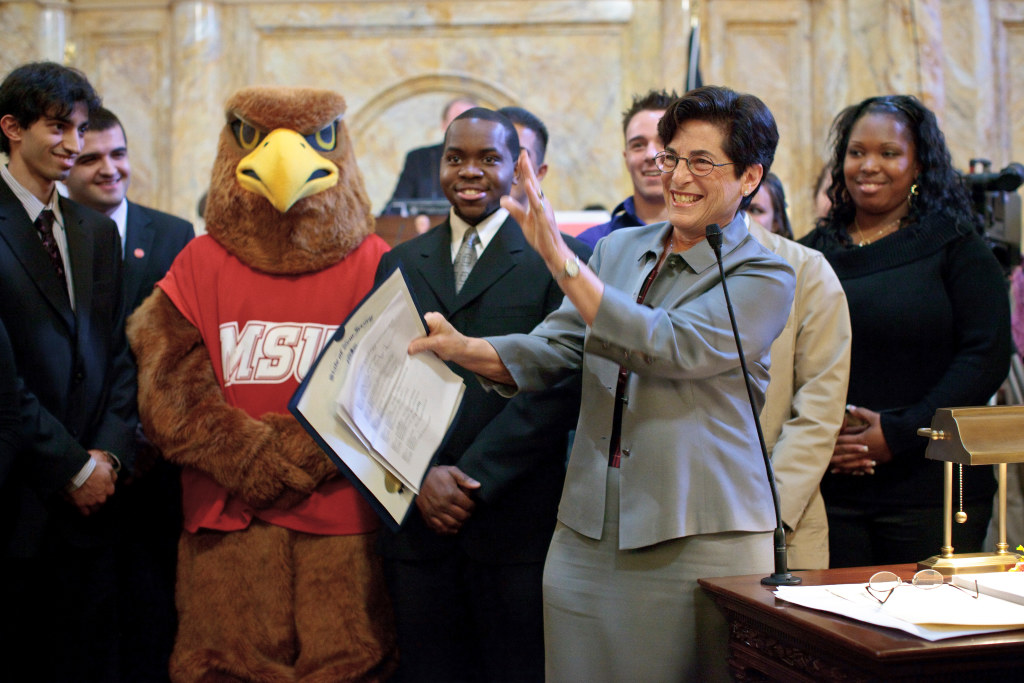 2010, President Susan Cole with students and Rocky at the Statehouse in Trenton to receive a Proclamation from the NJ State Senate, presented by Senate President Richard Cody in honor of being ranked by Forbes Magazine at the top NJ public university.