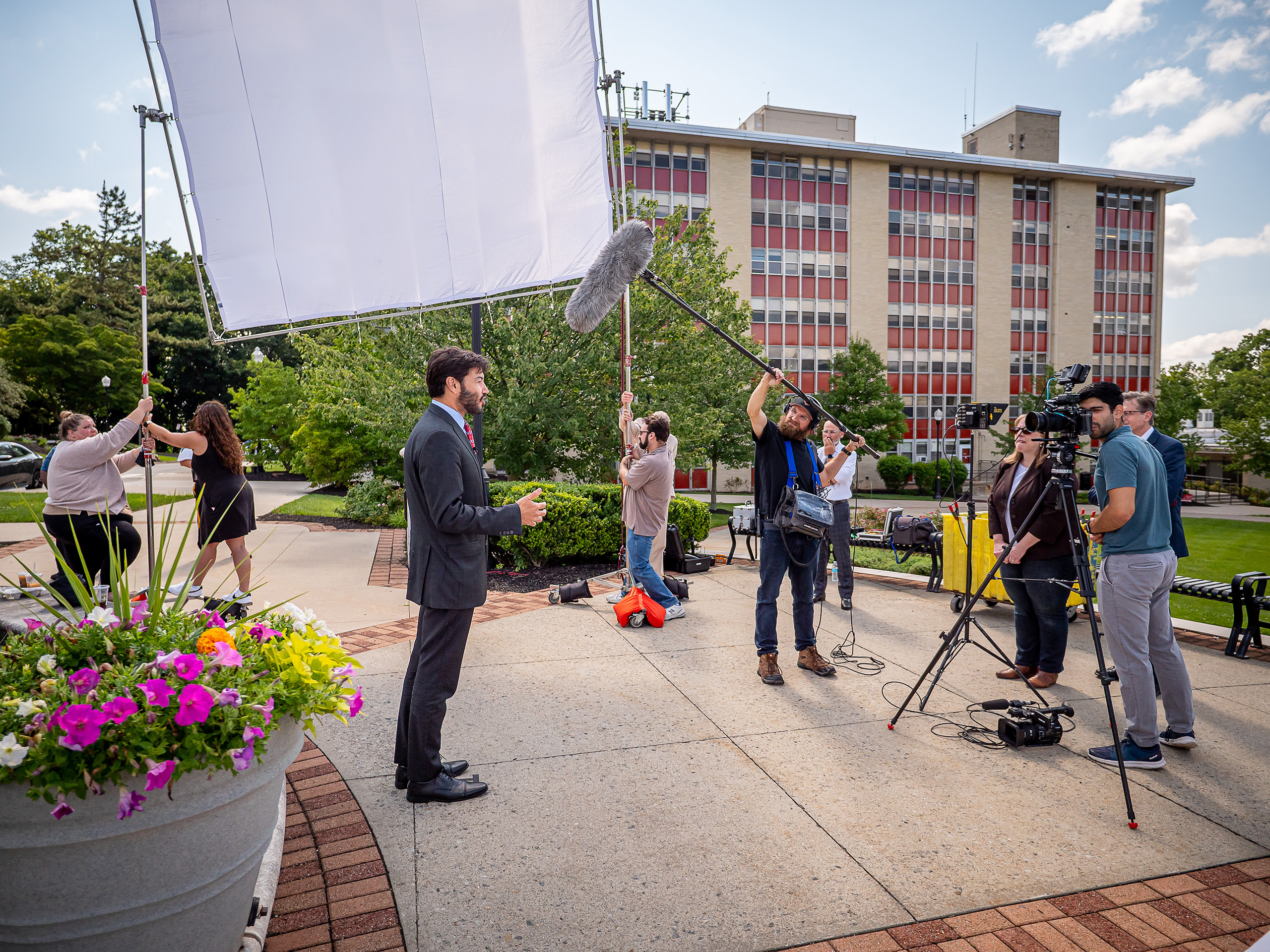 President Koppell filming on campus