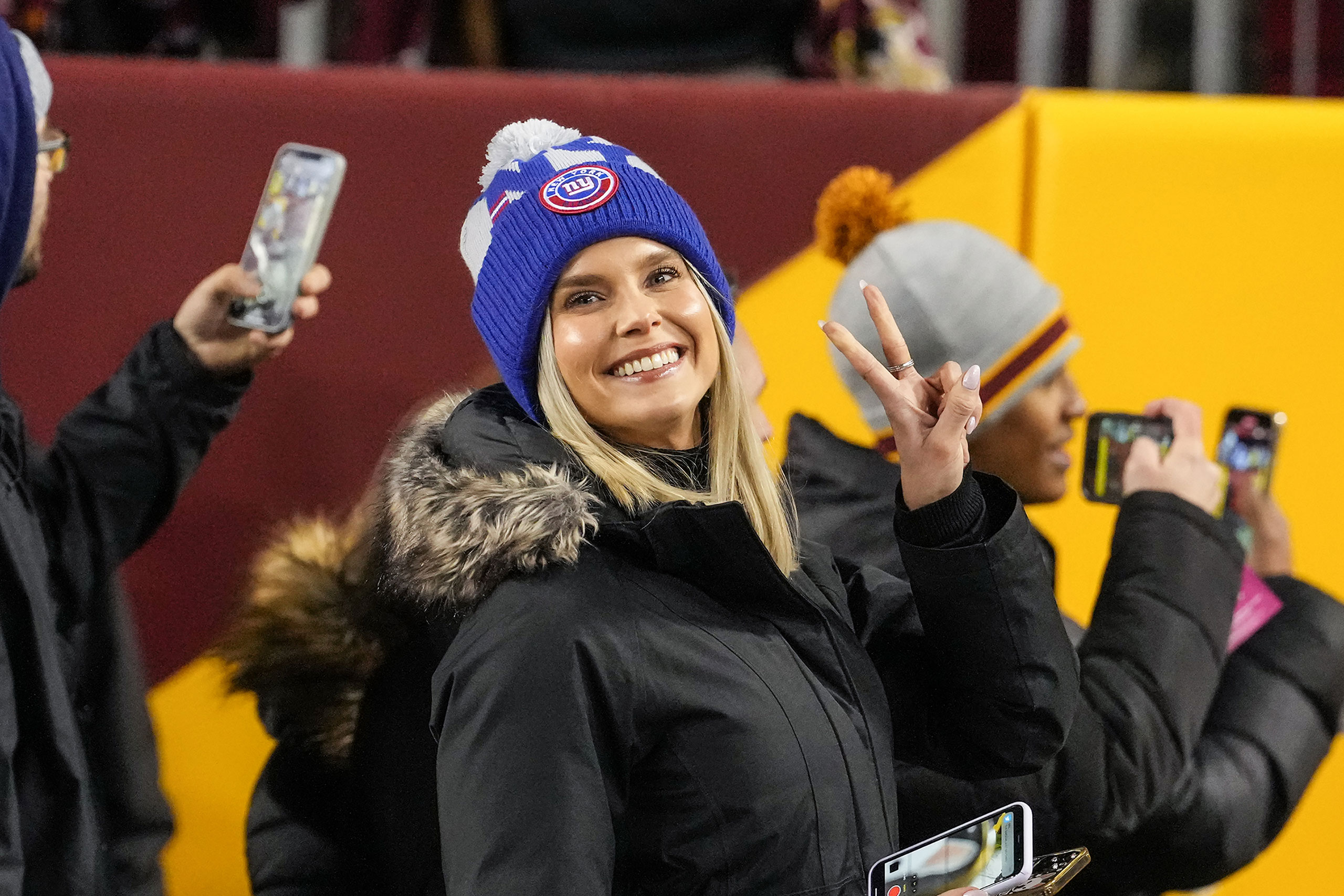 Emma Kaptein wearing a NY Giants knitted hat