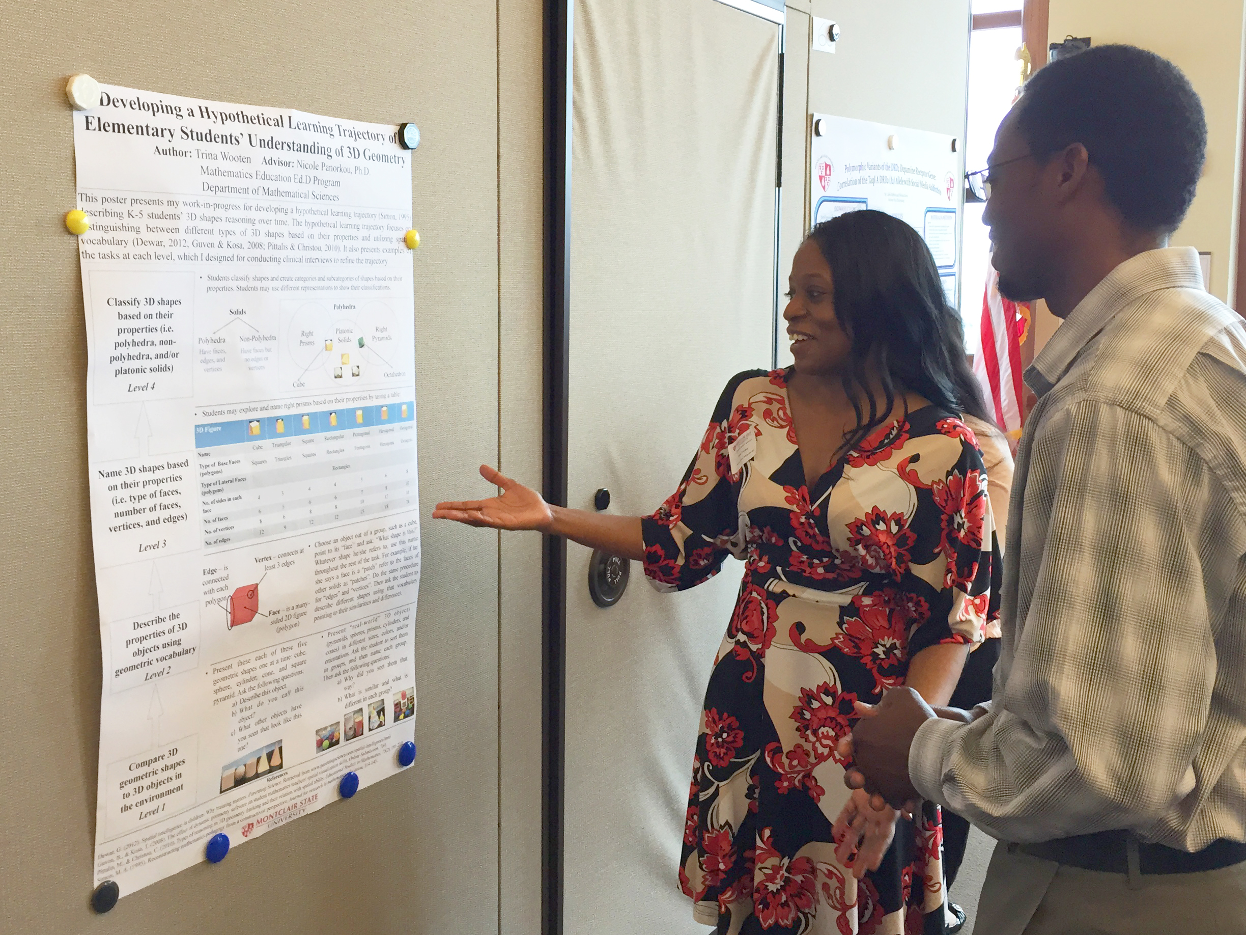 Trina Wooten showing her poster