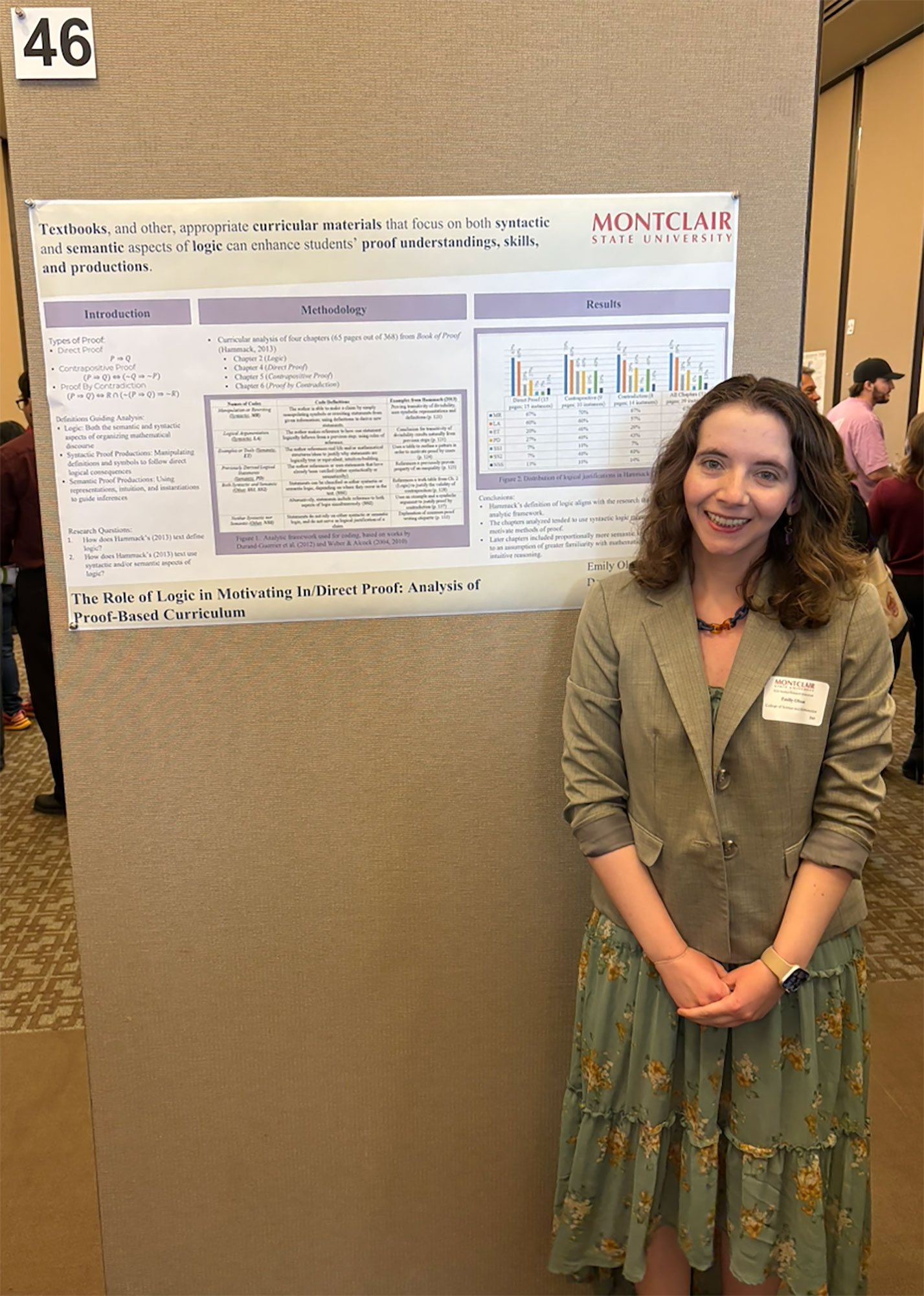Emily Olson with her poster at the Student Research Symposium