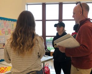 Jenna, Nikki and Lauren engage passerby at the Egyptian Algorithm Station