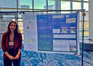 Emily Olson with poster at PME-NA 2024