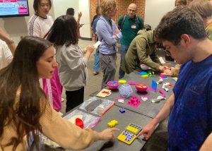 explaining game during Michael Frimpong and Dr. Greenstein run workshop at MAA-NJ