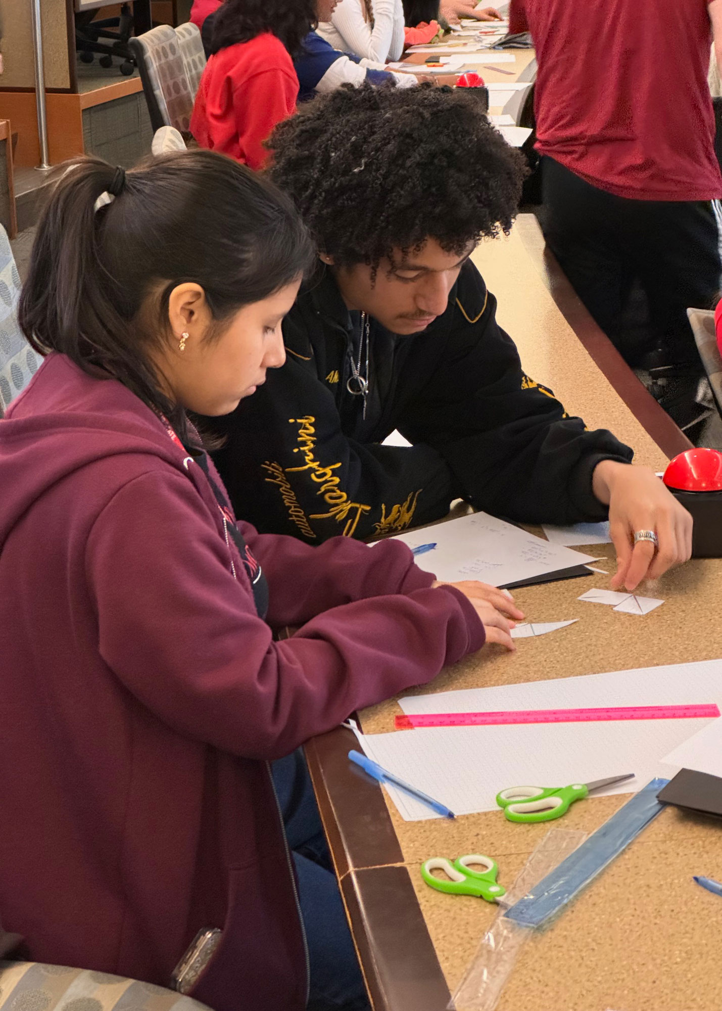 students working on problems at Math and Art Day 2025