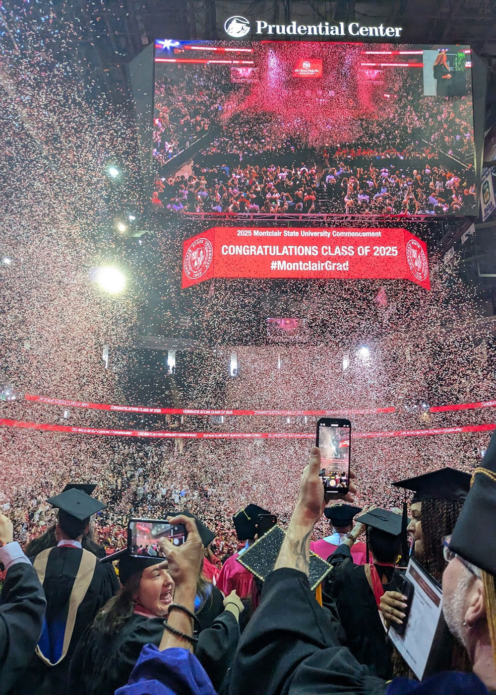mathematics grads at 2025 Commencement during confetti drop