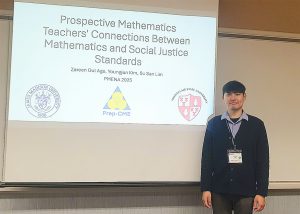 Youngjun Kim with his title slide for his PME-NA presentation