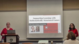 Doctoral candidate Toni York presenting at PME-NA meeting with her mentor, Dr. Eileen Fernandez