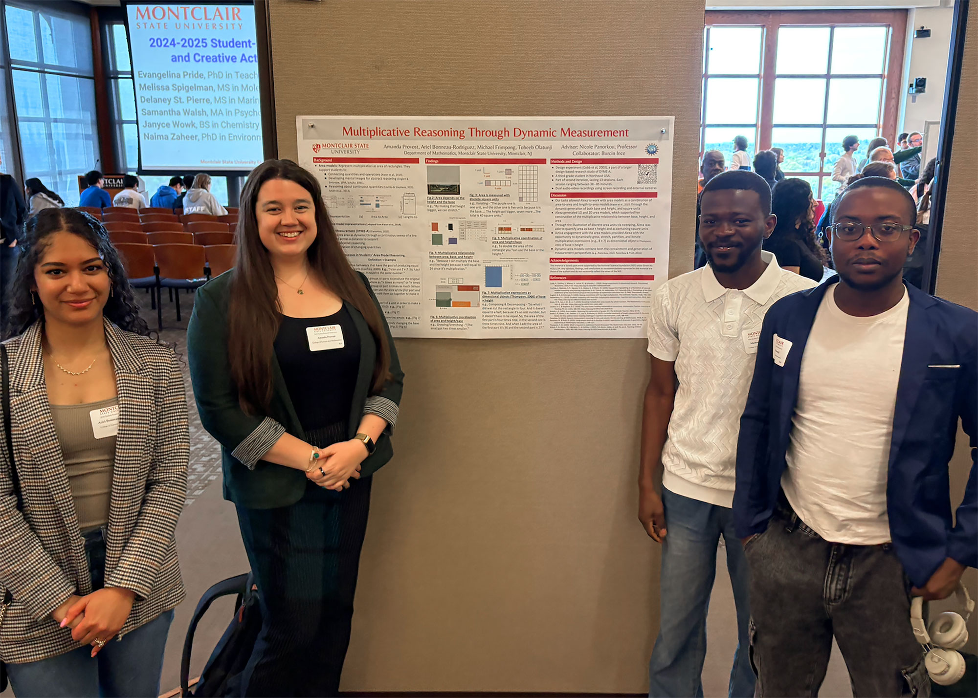 Doctoral candidate Amanda Provost, and doctoral students Ariel Bonneau Rodriguez, Michael Frimpong, and Toheeb Olatunji with their poster at the Student Research Symposium