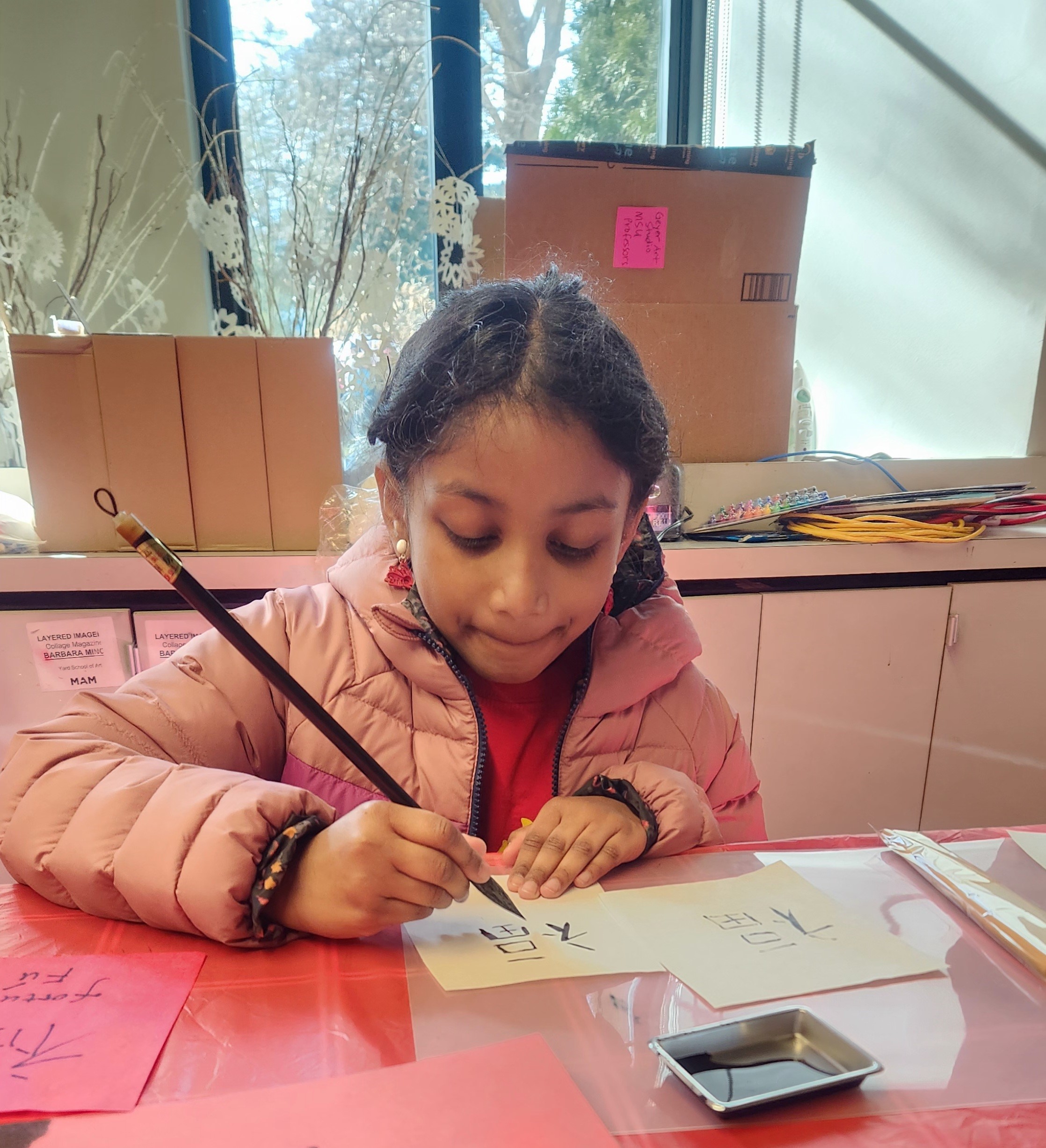 A child writing chinese characters