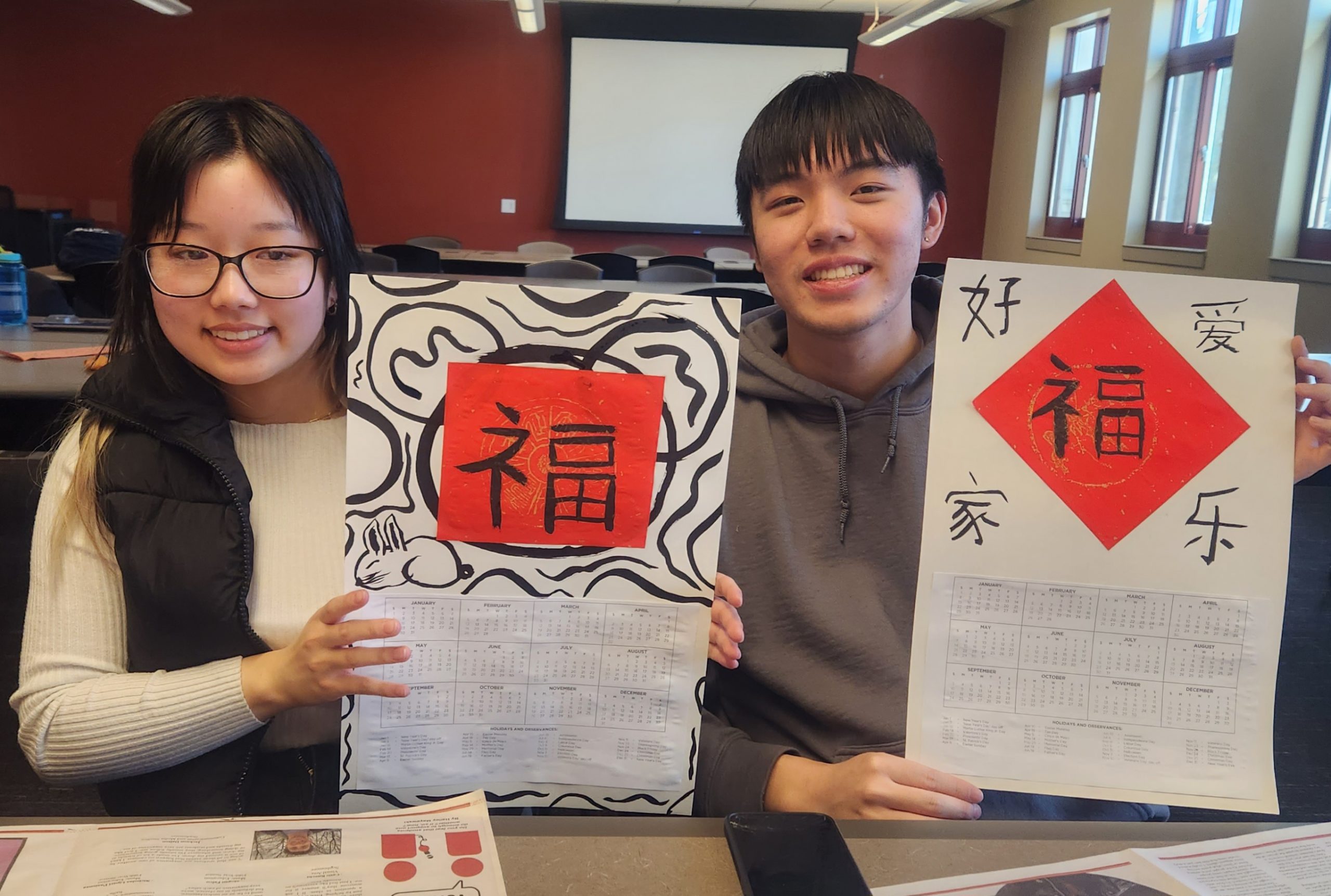 Photo of Chinese calendar with calligraphy writing
