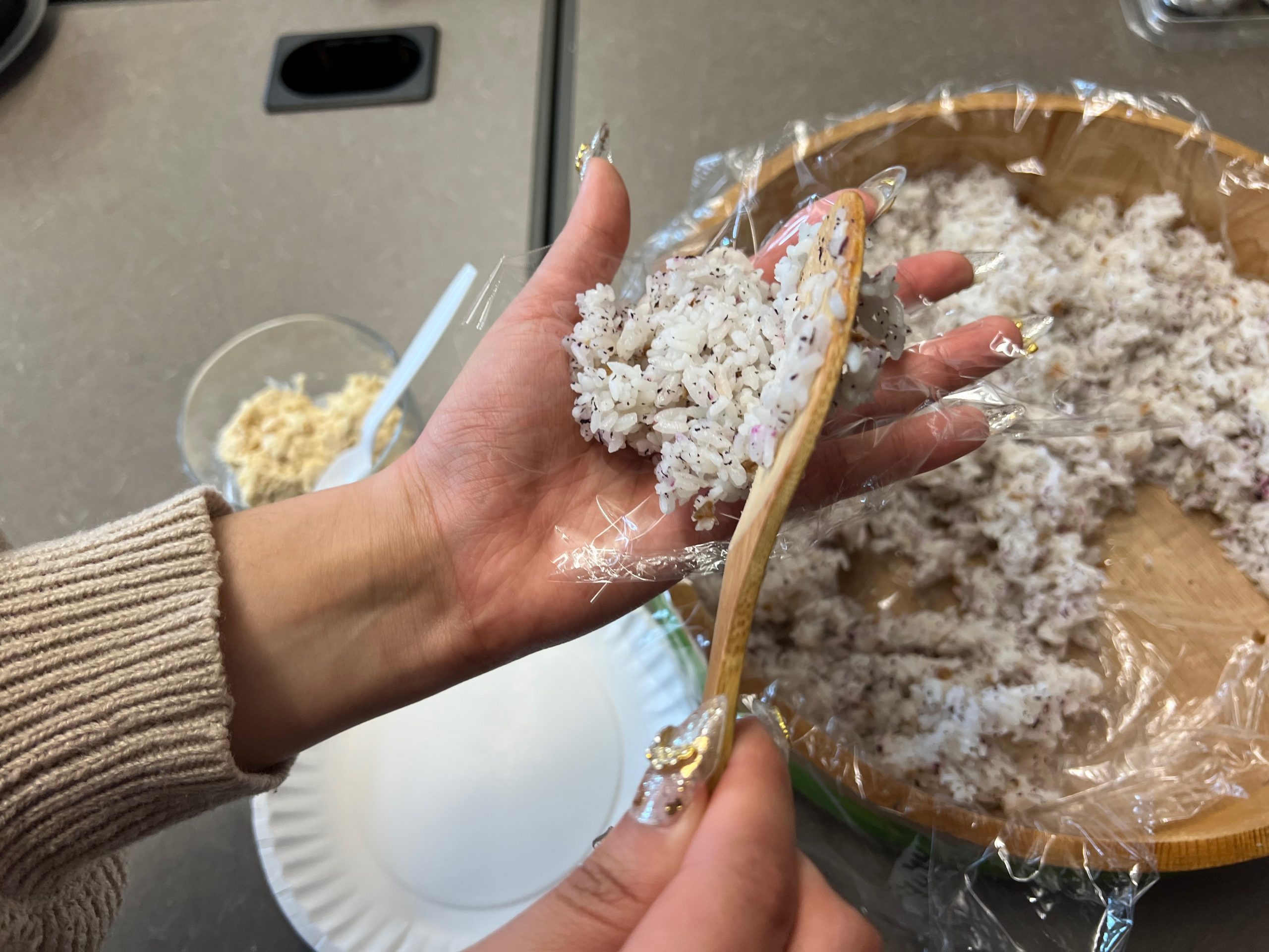 Photo of person making onigiri