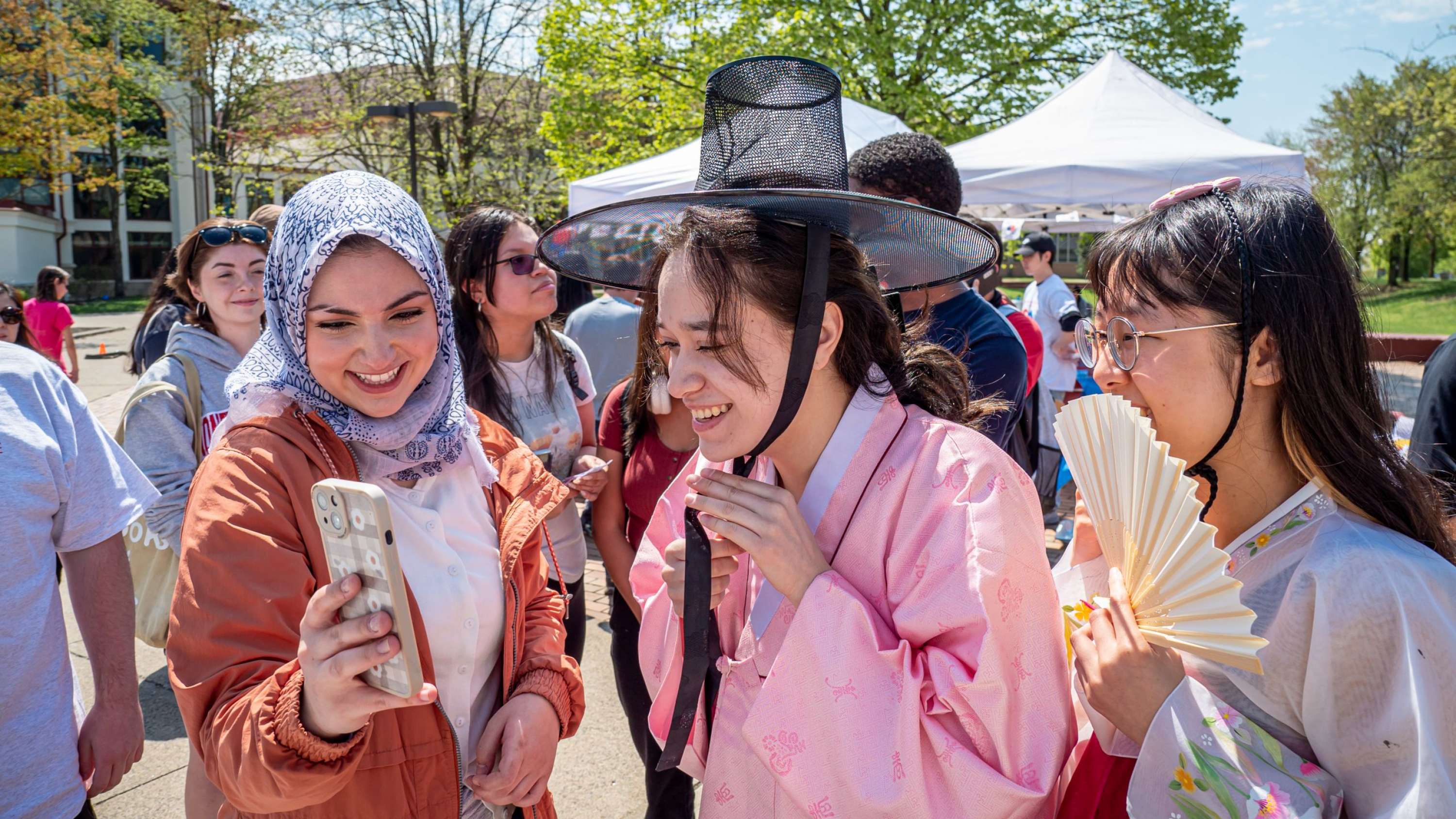 Trying on traditional Korean clothing.