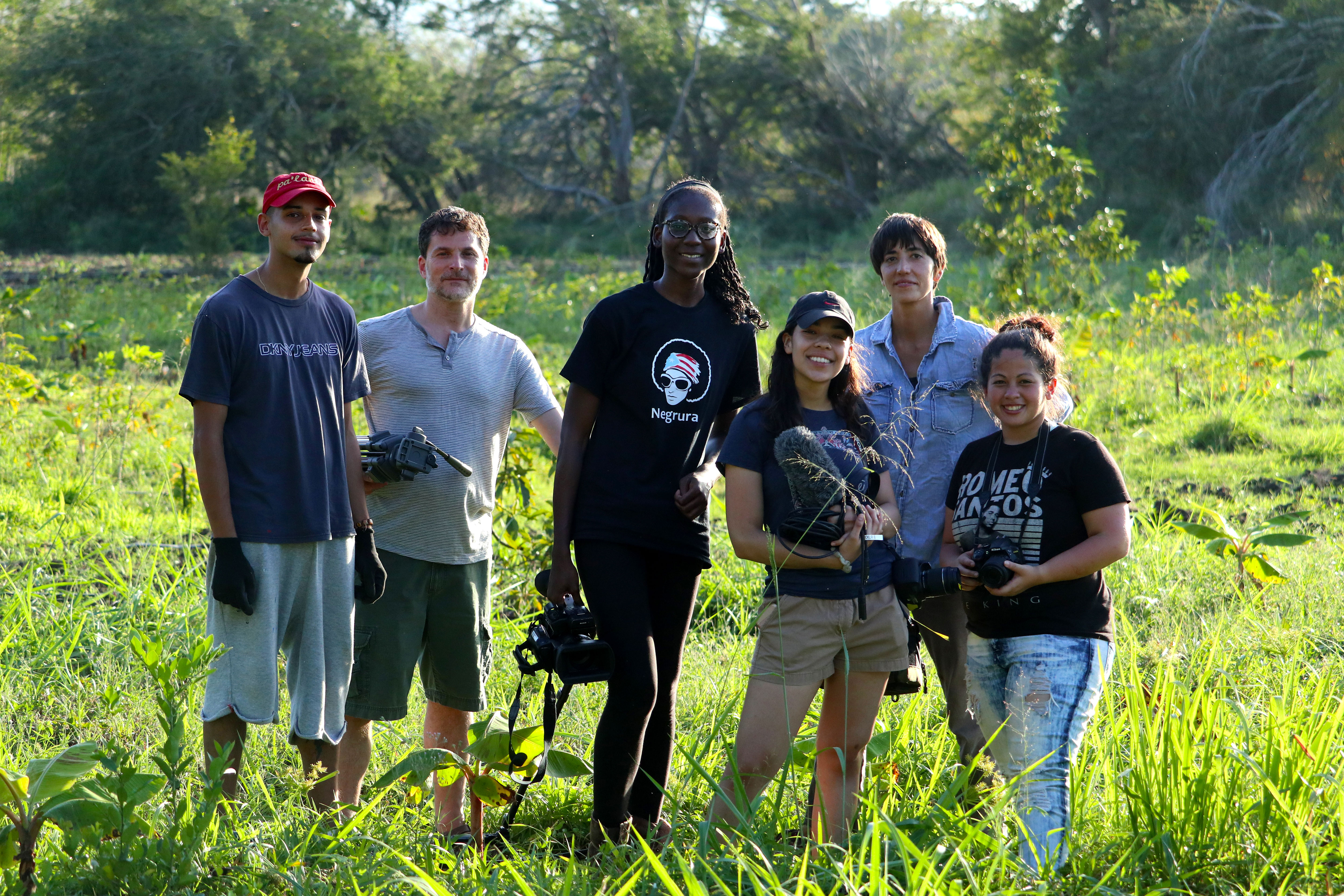 Students in Puerto Rico in grassy area