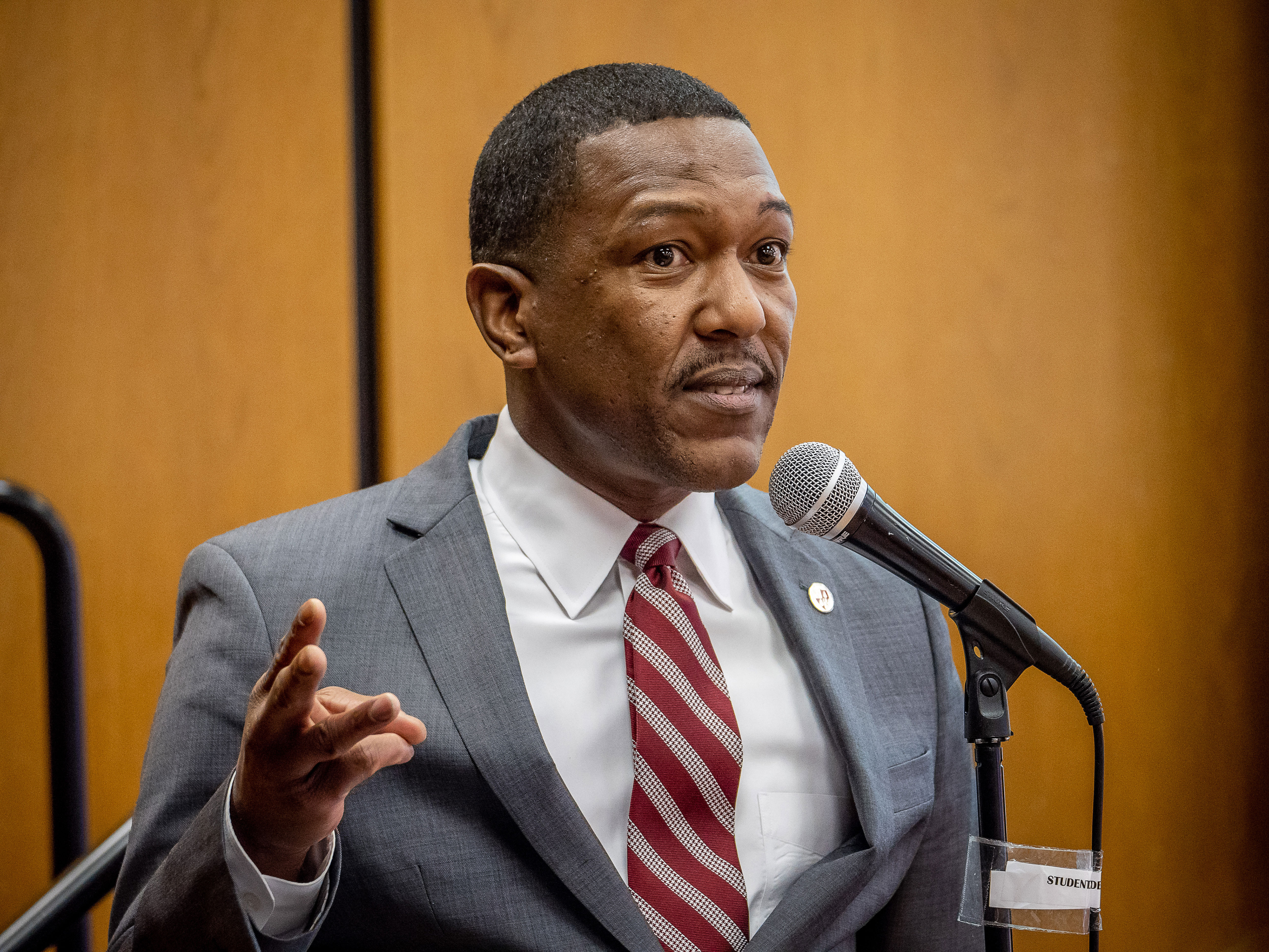 Dr. David Hood speaking at podium