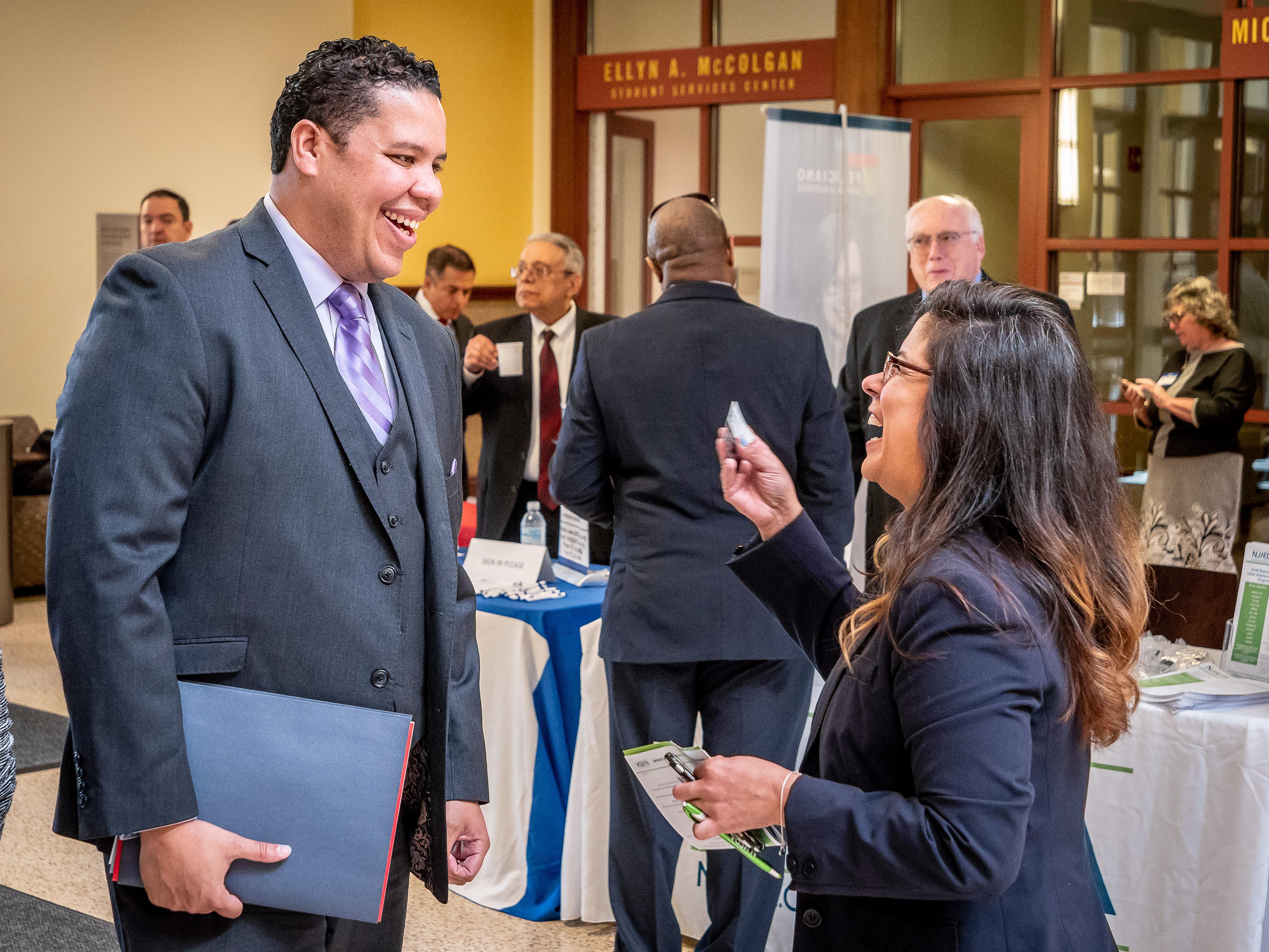 Man and woman speaking at the Latino Small Business Forum