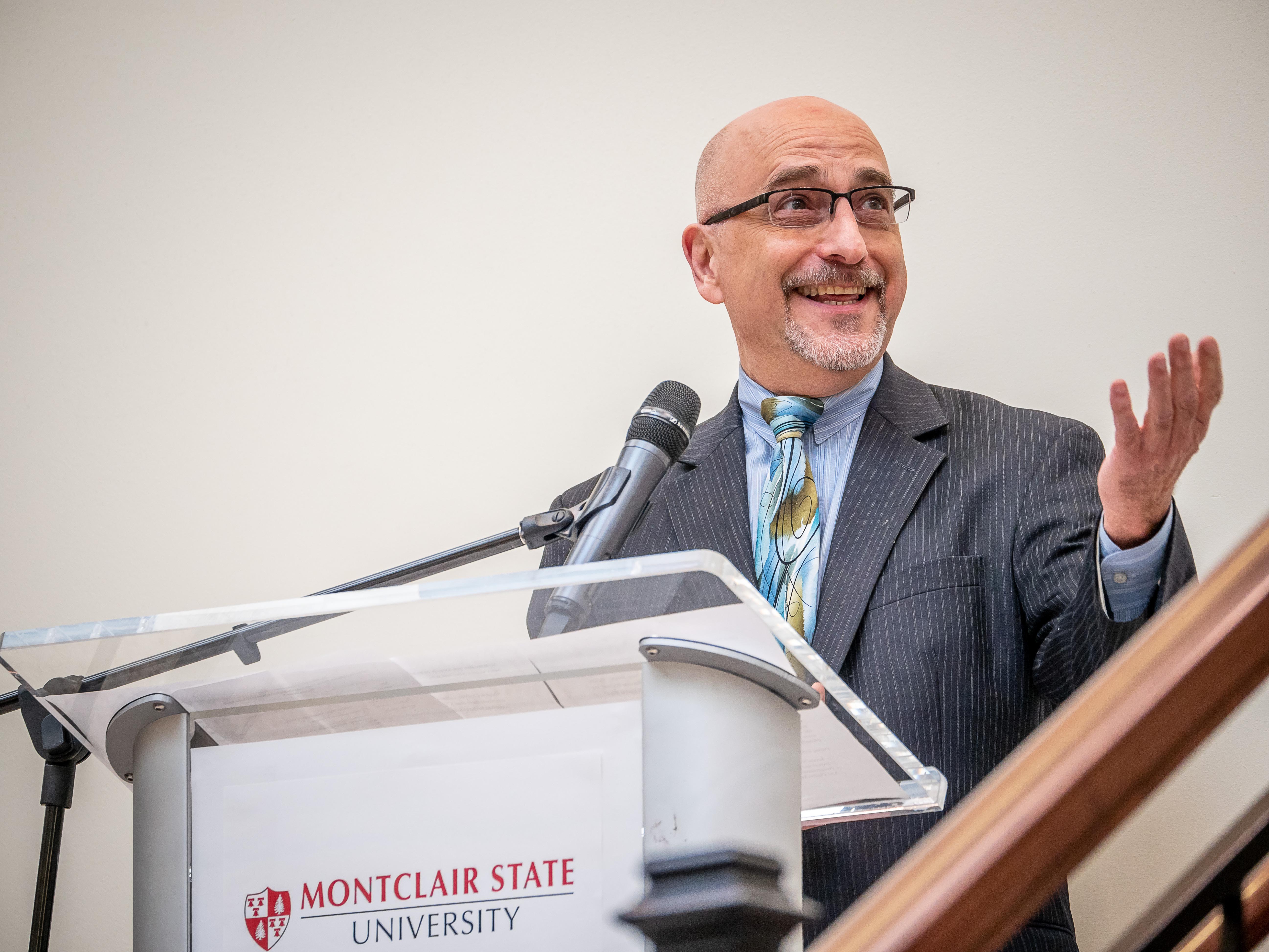 Man at podium speaking at Latino Small Business Forum