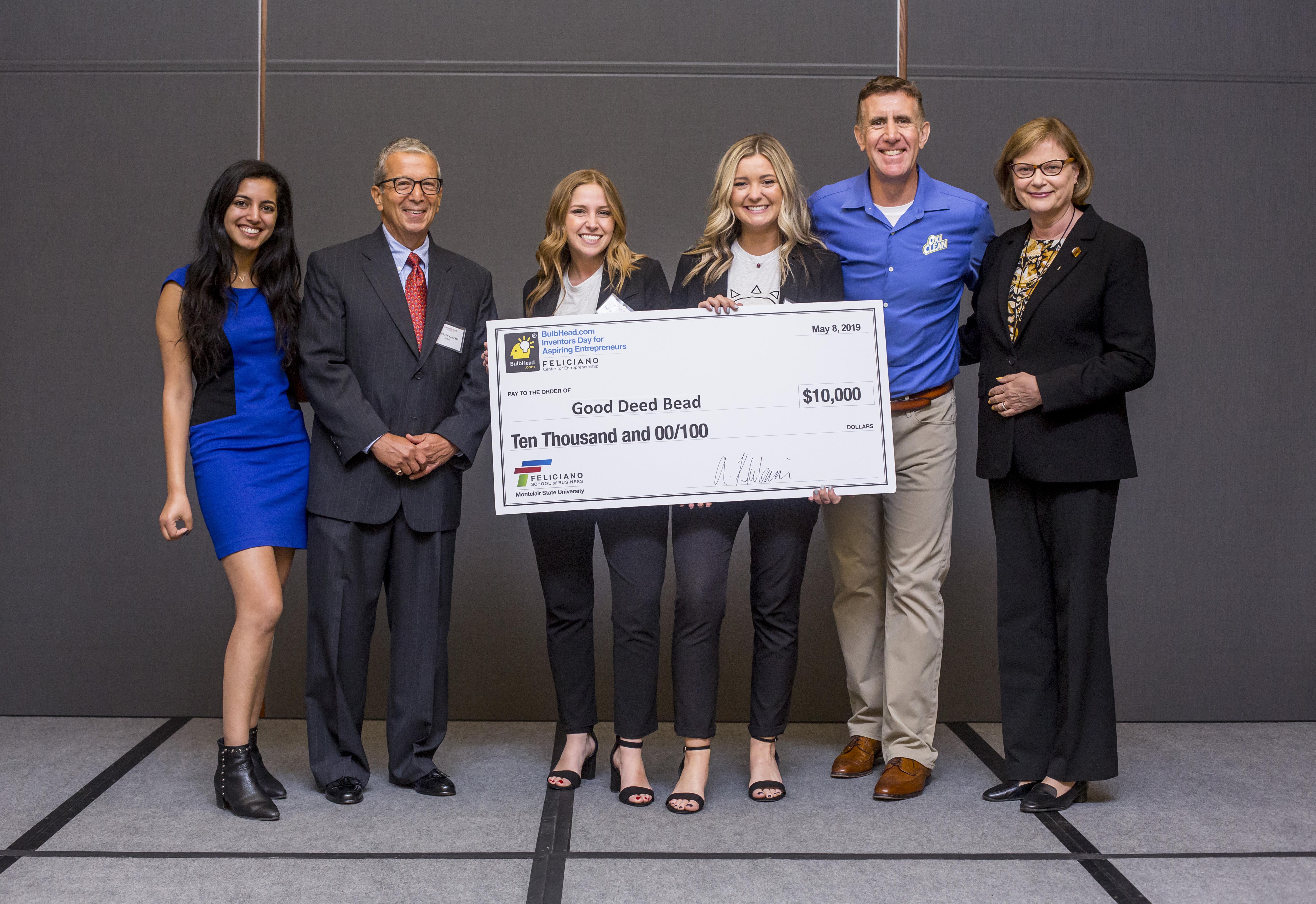 Runner ups holding check