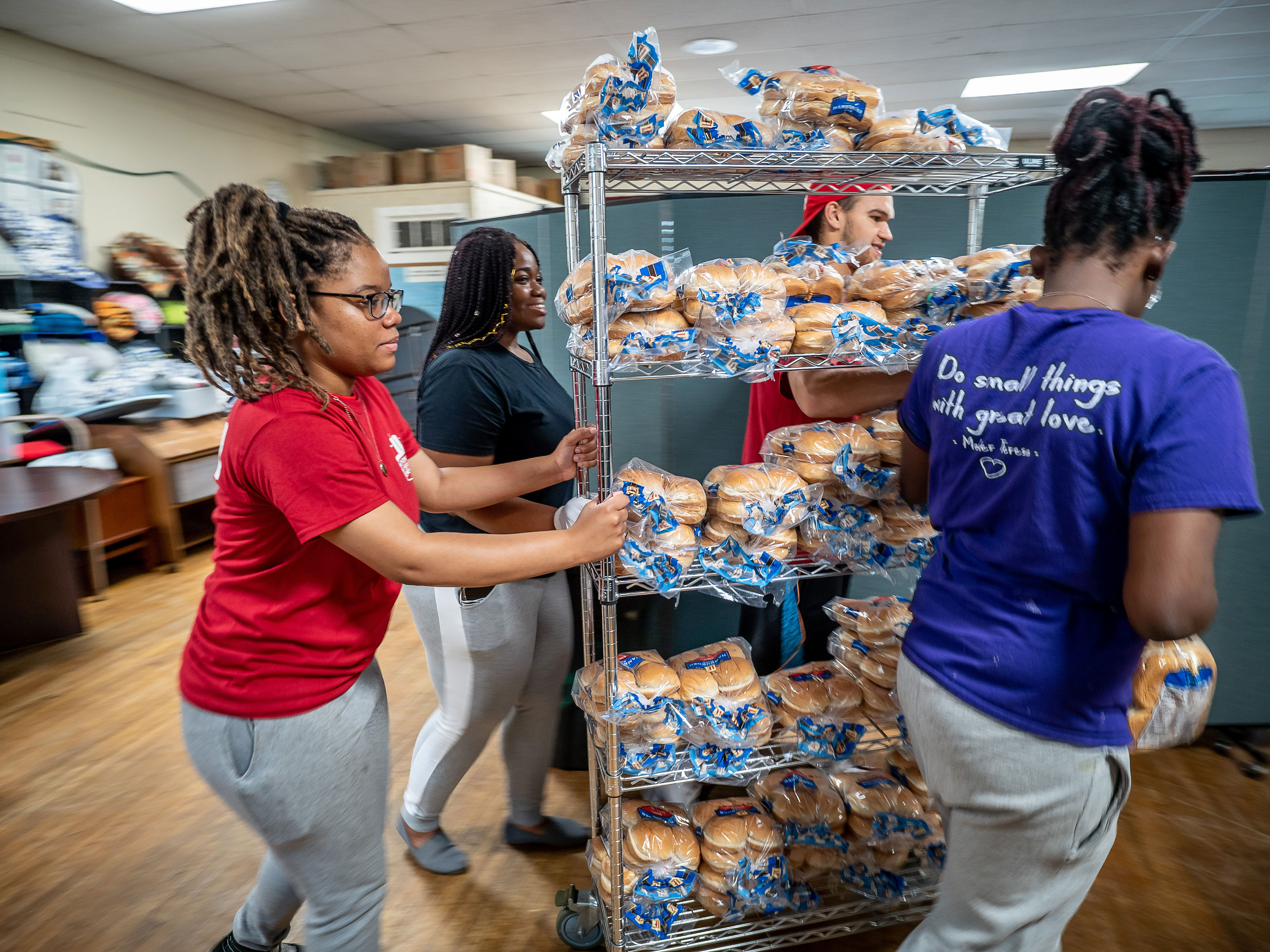 Volunteers lend a hand at St. Peter's Food Pantry in Clifton.