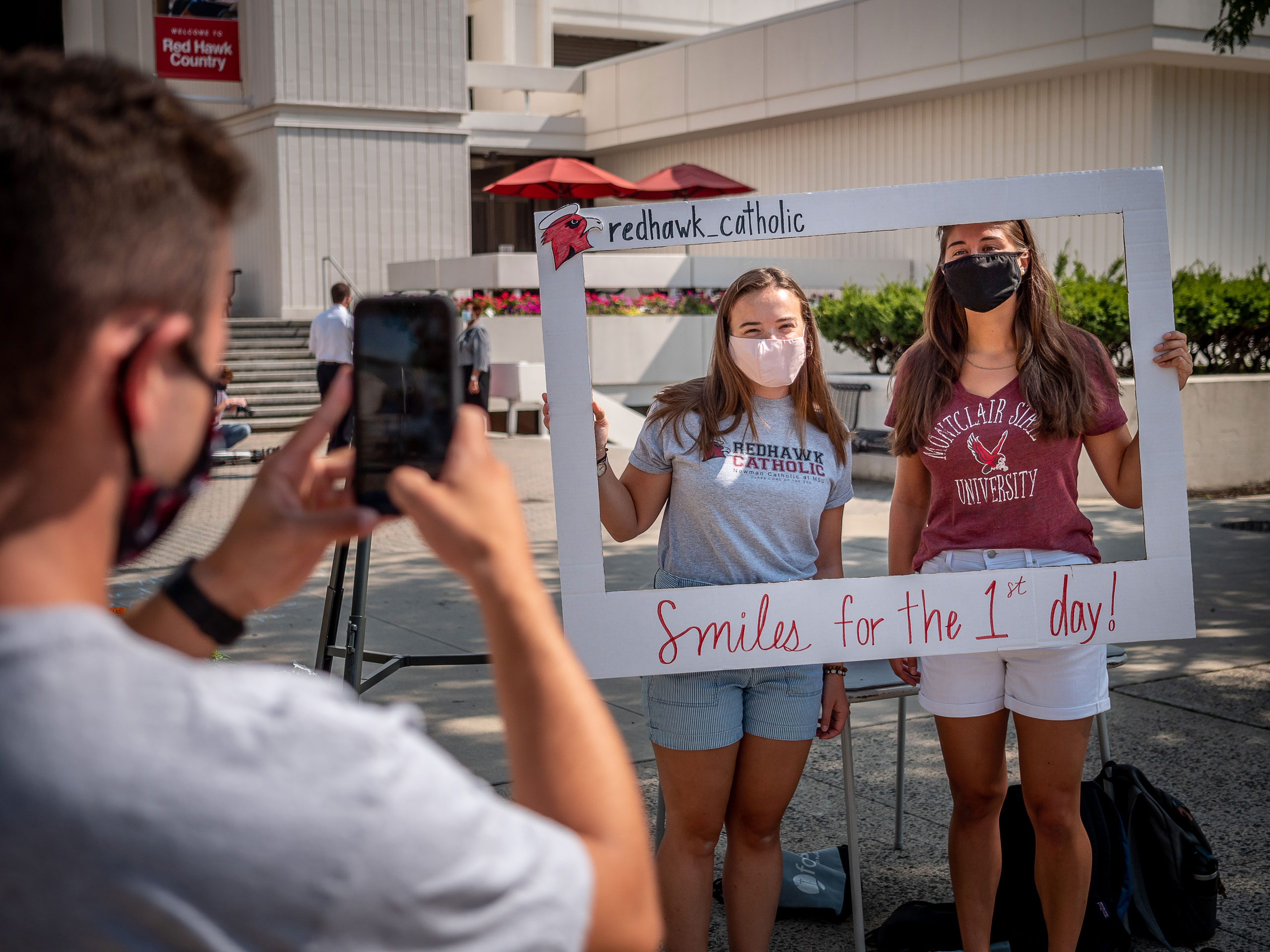 Students pose for photo for campus Catholic ministies.