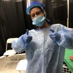 Photo of Valentina Valencia volunteering at a Covid vaccination site