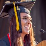 close view of undergraduate candidate speaking at lectern