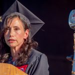 undergraduate candidate speaking at lectern