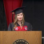 Undergraduate candidate at lectern