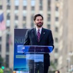 President Jonathan Koppell standing at the podium
