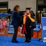 Student receiving their pin during the ceremony