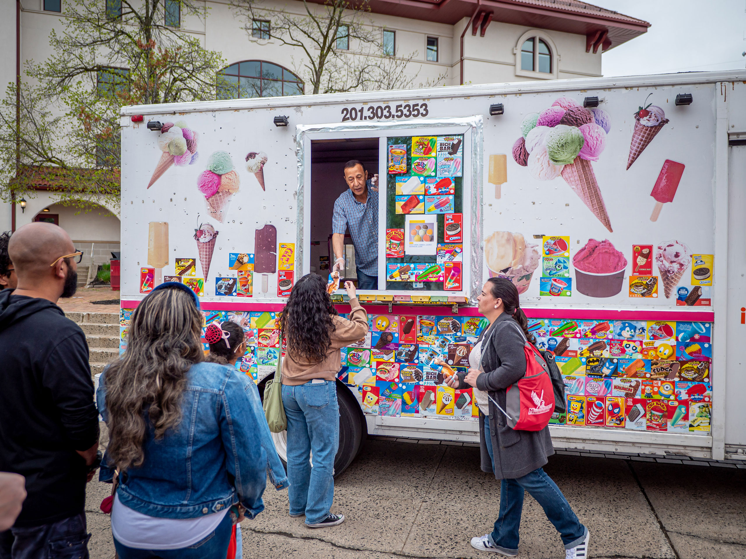 accepted student day attendees line up at ice cream truck