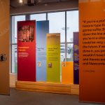 More banners, one with a quote from Larry Doby that reads "If you're a pioneer in a historic-type thing, you're gonna suffer. But you look down the line and see you're in a situation that could be very, very big in the future. If we hadn't done it, you probably wouldn't have the Mays and Aarons and Banks and Newcombes."