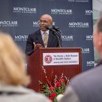 Developer Baye Adofo-Wilson speaks at the opening.