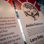 Signs explaining the history of the Negro leagues, highlighting Jackie Robinson and Larry Doby.