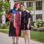 Iliana Woodhull kisses her daughter Angel Bernales on the temple on the Montclair campus.